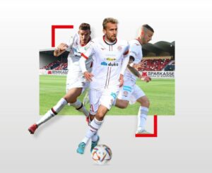 Fabian Tait und zwei weitere Teamkollegen vor dem Druso-Stadion